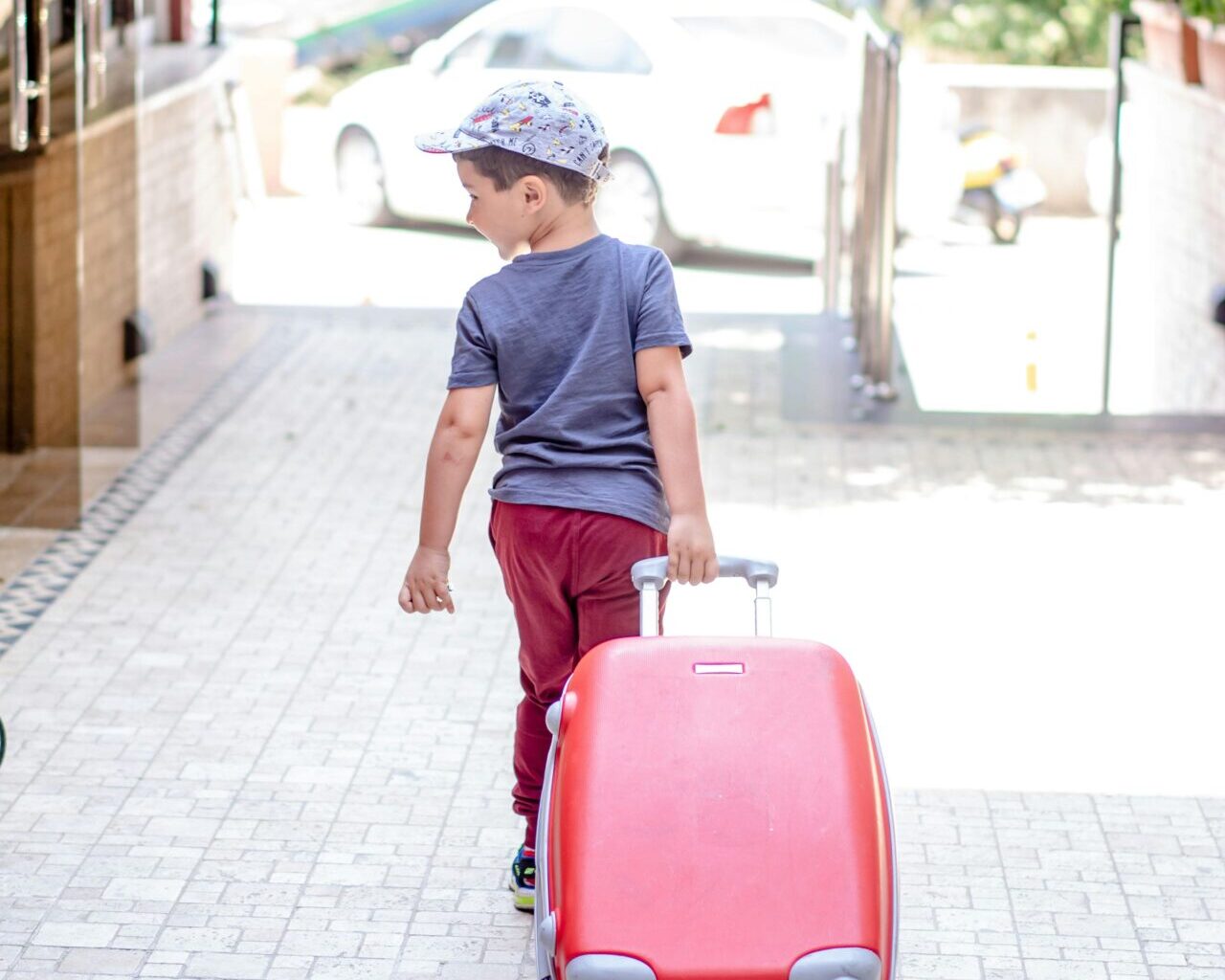 child with suitcase